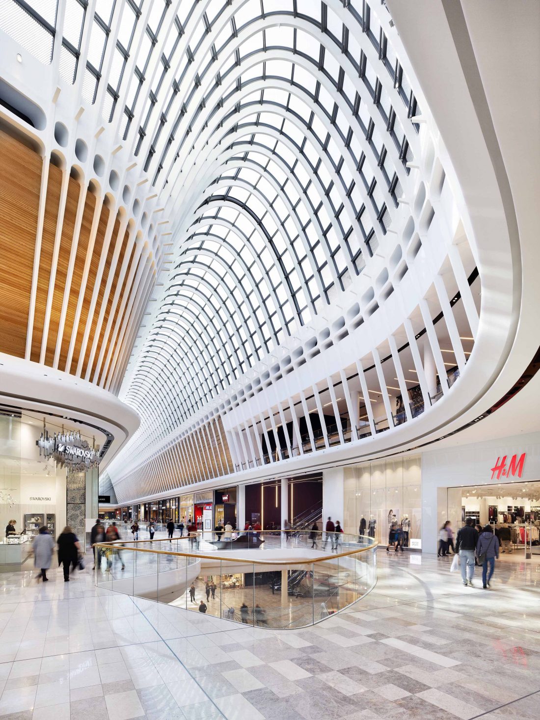 Architectural image showcasing a premium shopping space designed with exquisite retail architecture, featuring sleek lines, upscale materials, and innovative layouts.