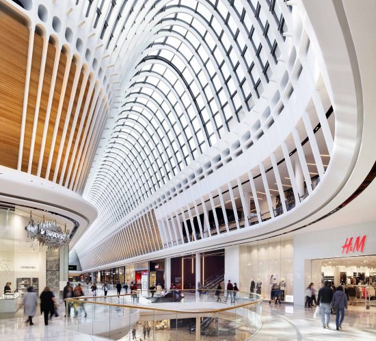 Architectural image showcasing a premium shopping space designed with exquisite retail architecture, featuring sleek lines, upscale materials, and innovative layouts.