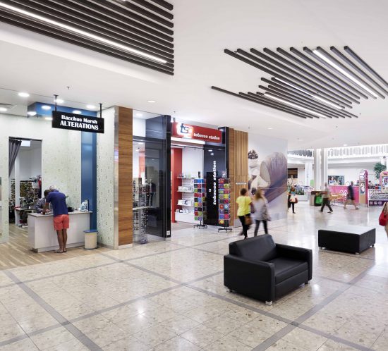 Architectural image showcasing a captivating shopping space, beautifully captured through the lens of retail photography, with stylish storefronts, modern fixtures, and inviting displays.