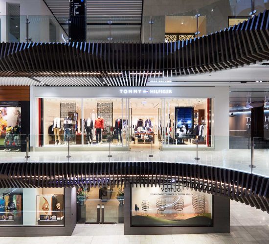 Exterior view of Tommy Hilfiger retail store in Melbourne, highlighting modern architectural design and captured through Melbourne architecture photography.