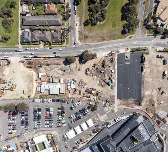 Aerial view of a construction site captured by an aerial photographer.