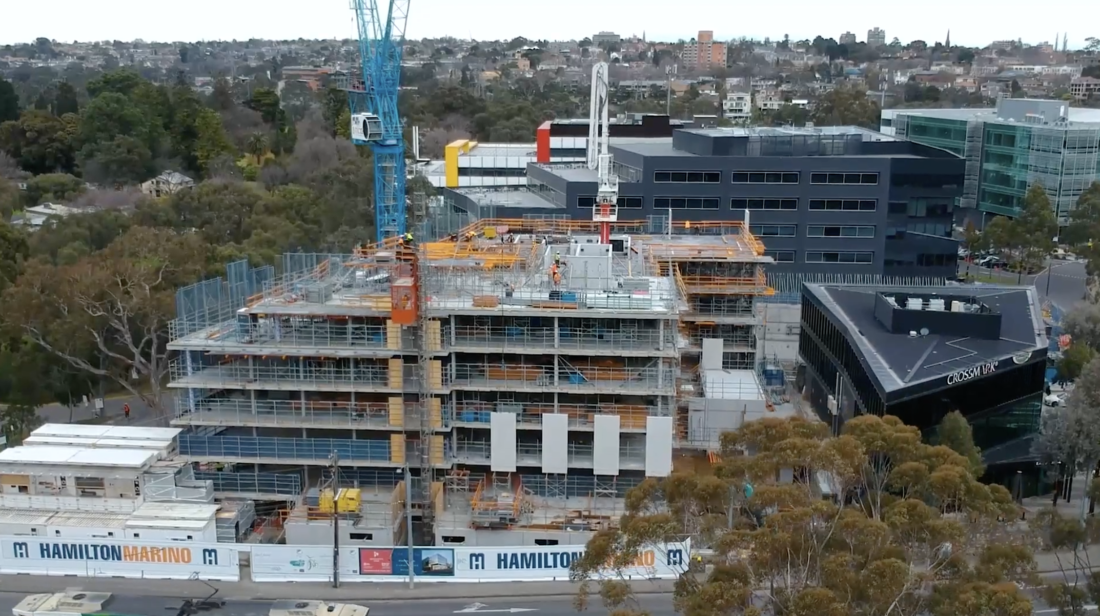 Aerial drone video showing office development construction progress