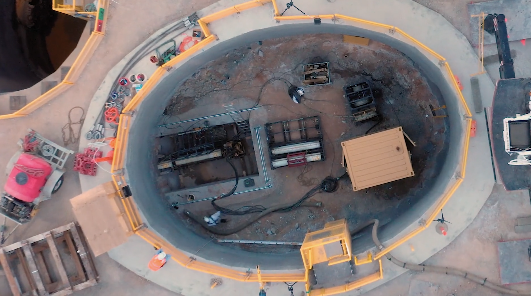 Aerial view of tunnel construction project captured with drone videography services.