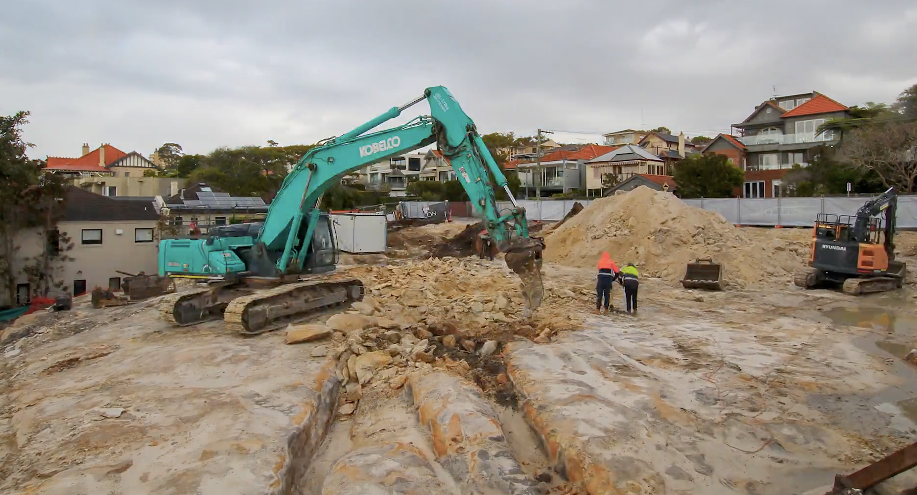 A dynamic building time-lapse video showcasing the construction progress of a modern residential development, highlighting various stages from excavation to completion.