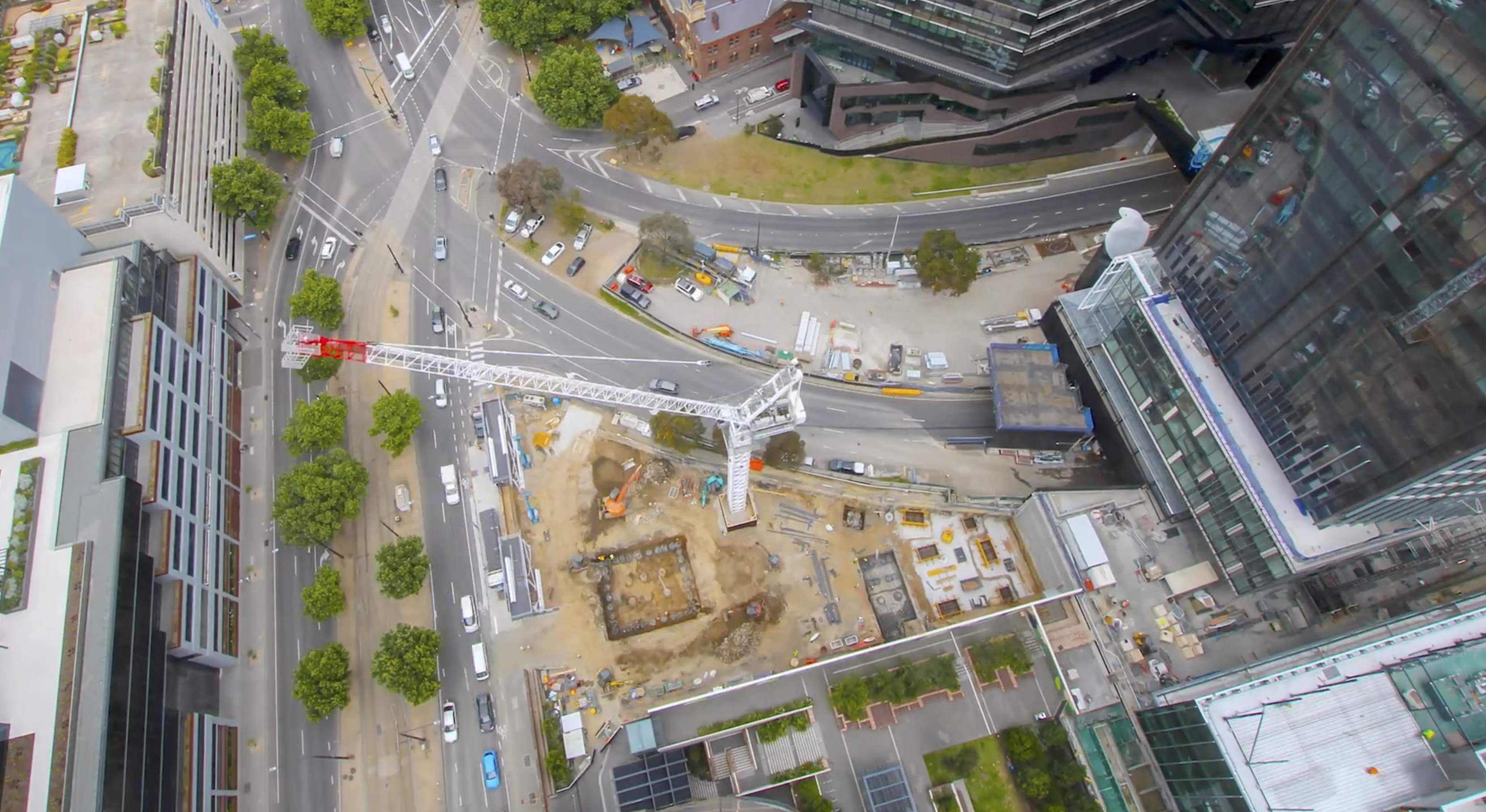 A time-lapse construction project video showing the progress of a large-scale building site, featuring cranes and construction equipment in action.