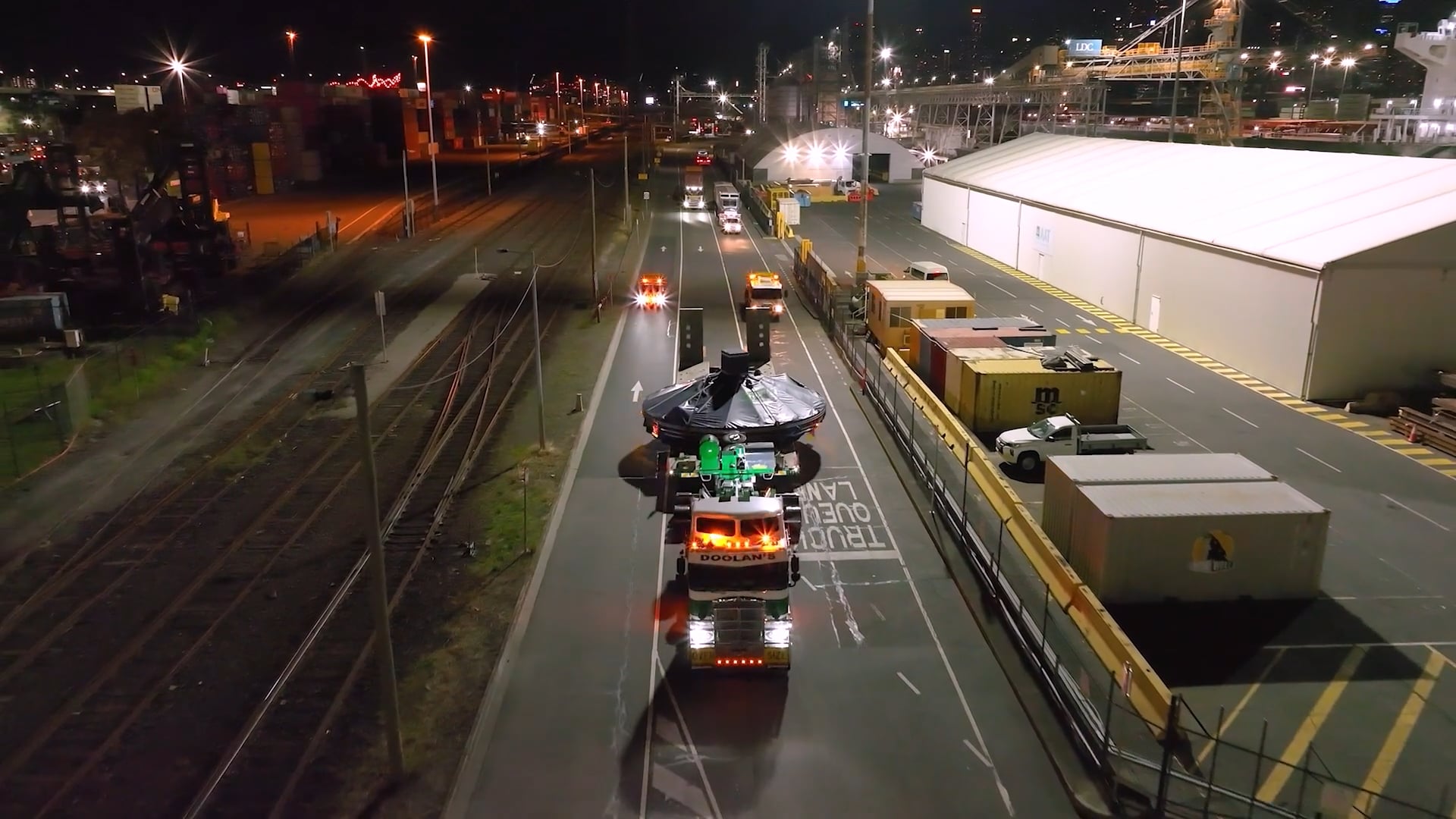 Drone shot of a Tunnel Boring Machine section on a truck at sunrise, captured with our infrastructure documentation solution.